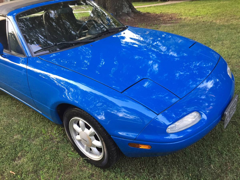 Illustration for article titled Could This Ultra-Low Mileage 1990 Mazda Miata be Worth $6,999?
